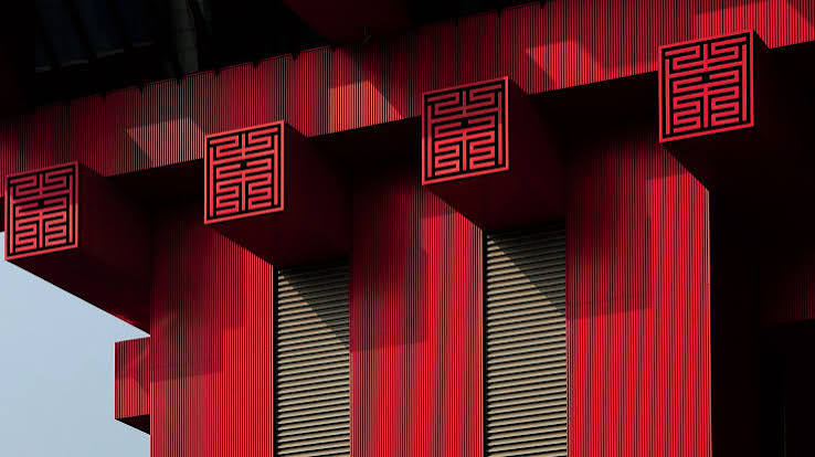 A contemporary red architectural facade