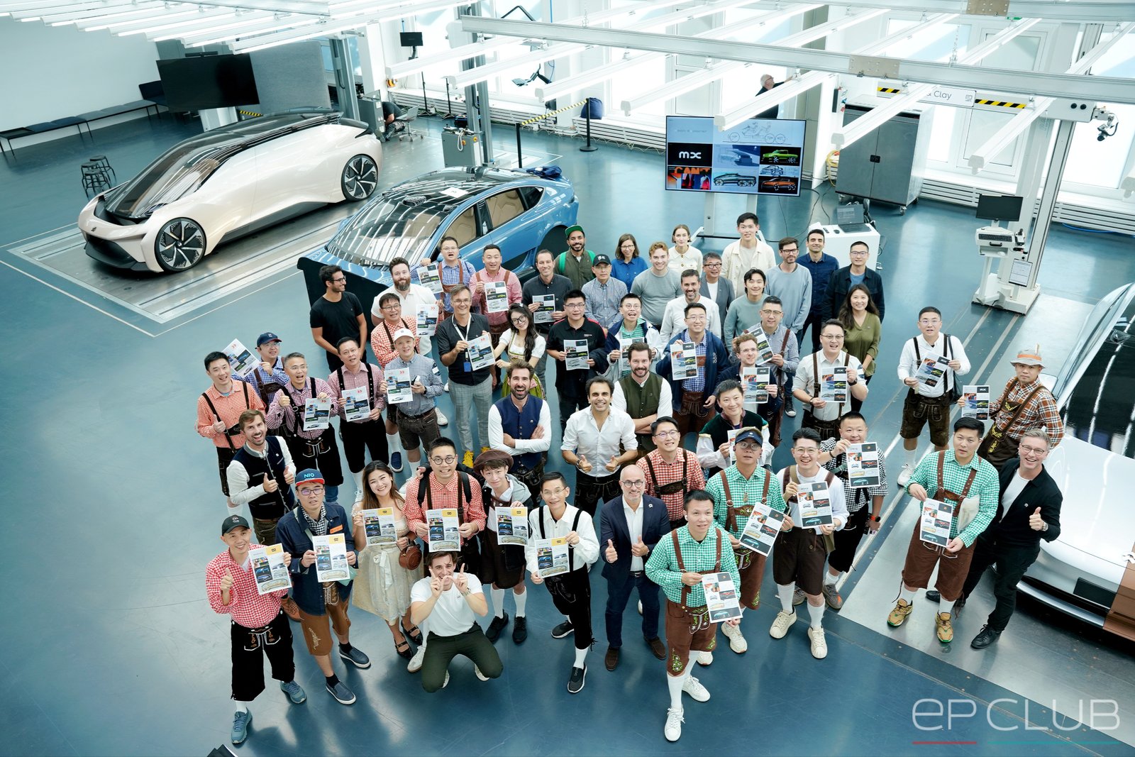 A group visiting an automotive design studio